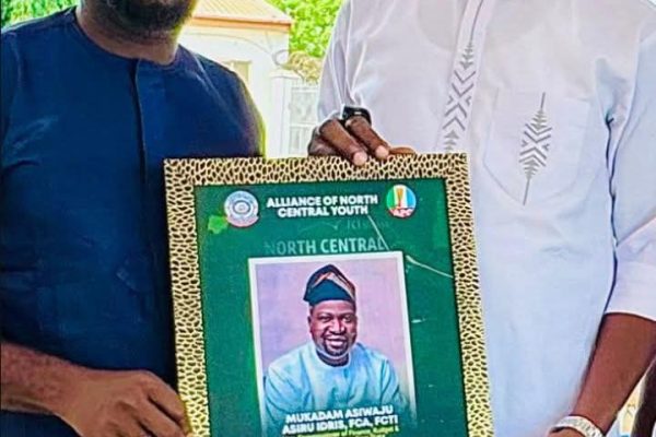 Comrade Gabriel Joshua Ojochegbe and Kogi State Commissioner for Finance, Budget and Economic Planning, Alhaji Mukadam Asiru Asiwaju Idris