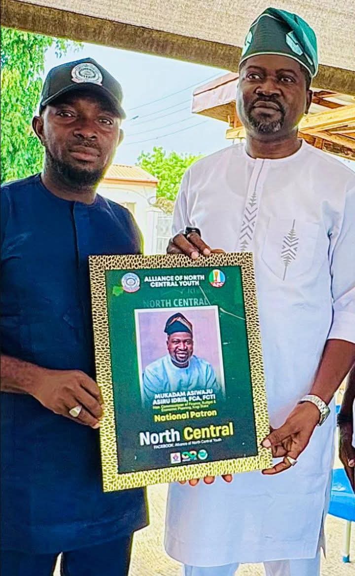 Comrade Gabriel Joshua Ojochegbe and Kogi State Commissioner for Finance, Budget and Economic Planning, Alhaji Mukadam Asiru Asiwaju Idris