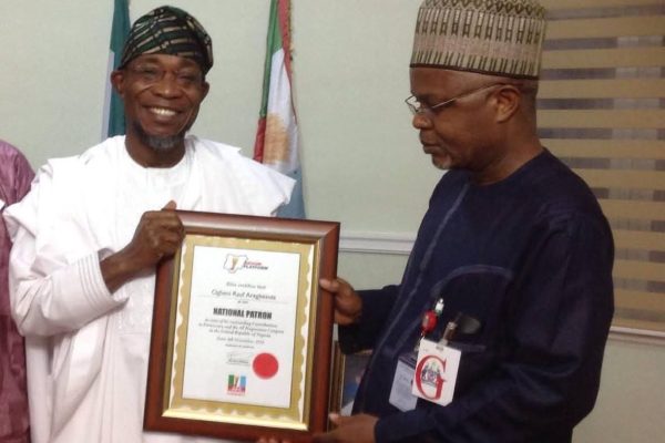 Former governor of Osun State and National Secretary of the African Democratic Congress (ADC), Ogbeni Rauf Aregbesola (L) and Former Commissioner for Information in Kogi State, Hon..Tom Ohikere (R)