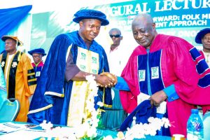 Professor of Theatre for Development at Prince Abubakar Audu University (PAAU), Anyigba, Professor William Sunday Onogu and Vice-Chancellor of Prince Abubakar Audu University, Professor Salisu Ogbo Usman