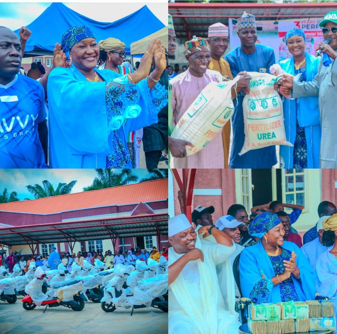 Dr. Hajarat Danyaro Ibrahim presenting motorcycles, fertilisers and cash grants to beneficiaries during the 11th Talafin Tafisu Empowerment Programme in Nasarawa.