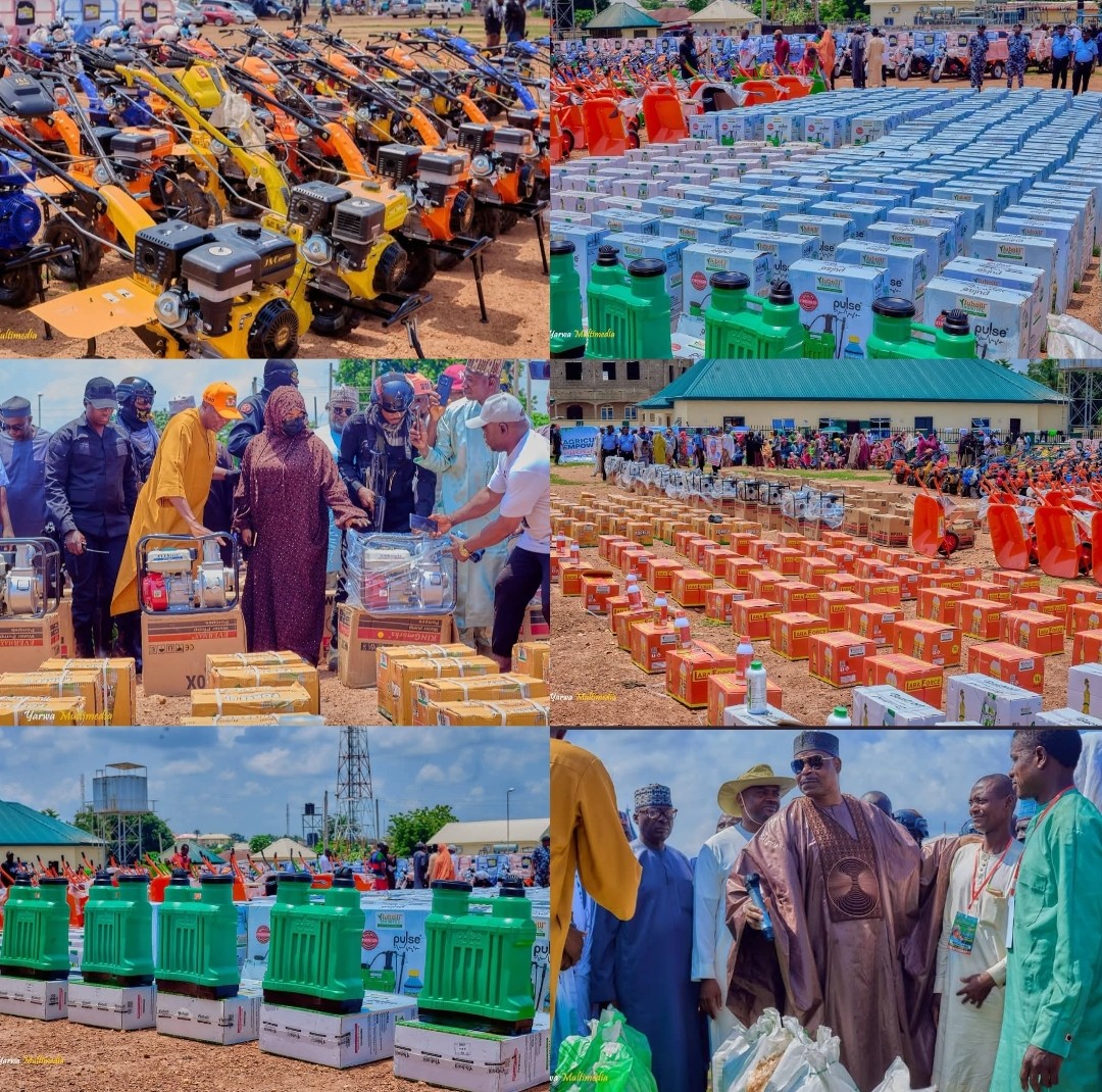 Mohammed Abubakar Adamu during agricultural input distribution in Karu Nasarawa State