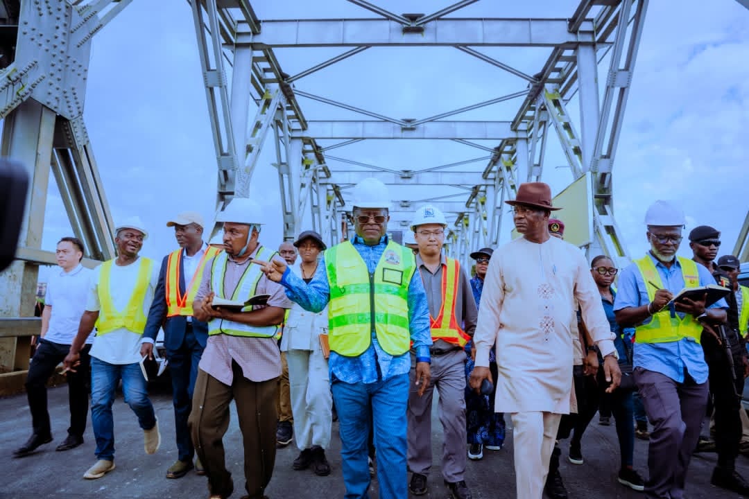 Minister of Works, Senator David Umahi and contractors at the First Niger Bridge