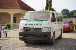 Senator Sunday Karimi's reported donation of an 18-seater bus and six motorcycles to community security groups in Kogi West.